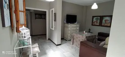 Una televisión o centro de entretenimiento en Alojamiento casa típica de Córdoba