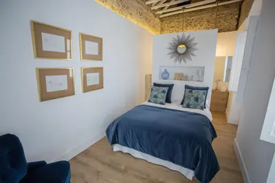 Cama o camas de una habitación en Casa Poeta Cordobés Ricardo Molina