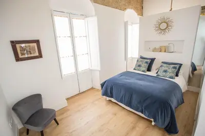 Cama o camas de una habitación en Casa Poeta Cordobés Ricardo Molina