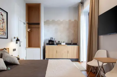 Cama o camas de una habitación en Welldone Metropol