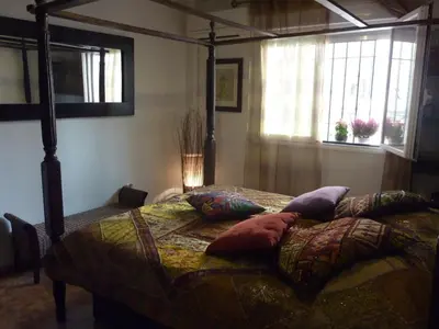 Cama o camas de una habitación en Romantic flat near the mosque