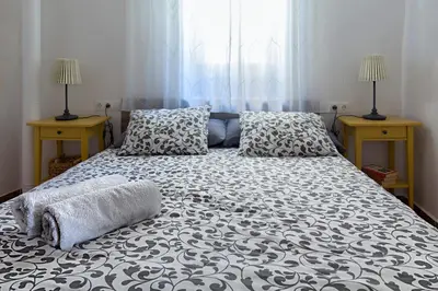Cama o camas de una habitación en Casa del Arrabal