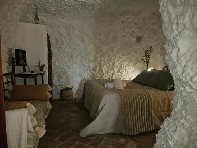 Cama o camas de una habitación en Cueva El Madrono