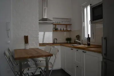 Una cocina o zona de cocina en Tu Patio en Sevilla