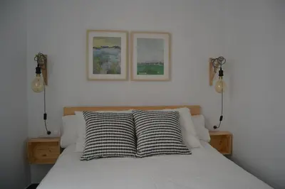 Cama o camas de una habitación en Tu Patio en Sevilla