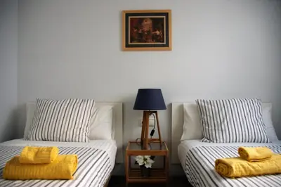 Cama o camas de una habitación en Encantador Ático con Terraza