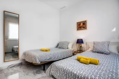 Cama o camas de una habitación en Encantador Ático con Terraza