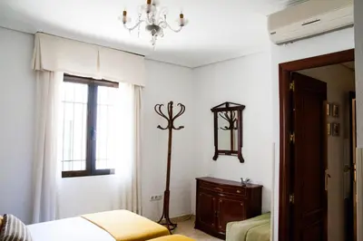 Cama o camas de una habitación en La Librería de Viana