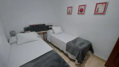 Cama o camas de una habitación en La Librería de Viana