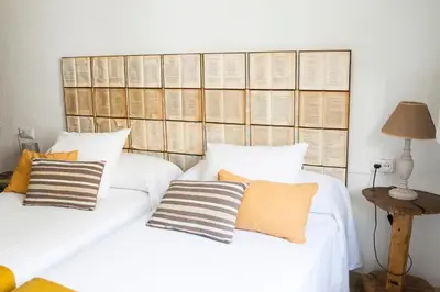 Cama o camas de una habitación en La Librería de Viana