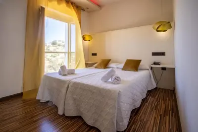 Cama o camas de una habitación en Hotel Villa De Setenil