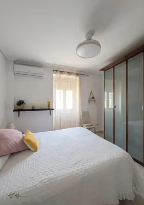 Cama o camas de una habitación en Apartamento Polvora, junto al Puente Romano