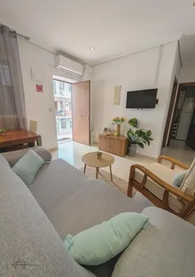 Una televisión o centro de entretenimiento en Apartamento Polvora, junto al Puente Romano