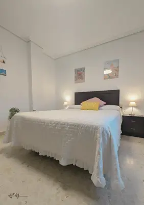 Cama o camas de una habitación en Apartamento Polvora, junto al Puente Romano