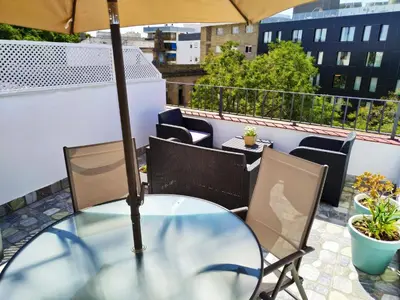 Un balcón o terraza de Charming Terrace - Sunny Chill Out Terrace