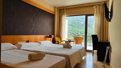 Cama o camas de una habitación en Hotel Mencia Subbética