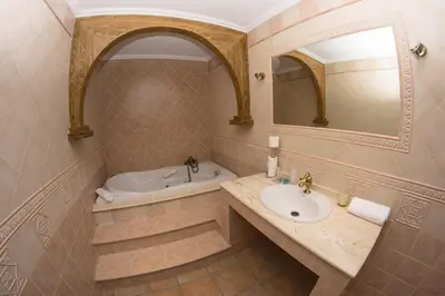 Un baño de Apartamento Los Arcos