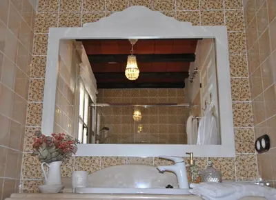 Un baño de Suites La Posada De Pilar