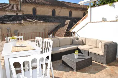 Zona de estar de Suites La Posada De Pilar
