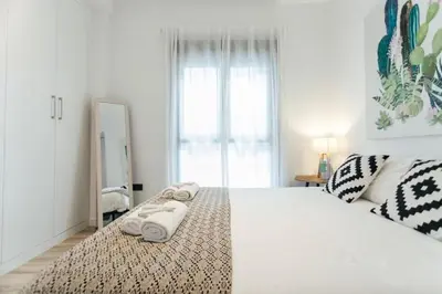 Cama o camas de una habitación en Bright and modern 2D apartment - Seville center
