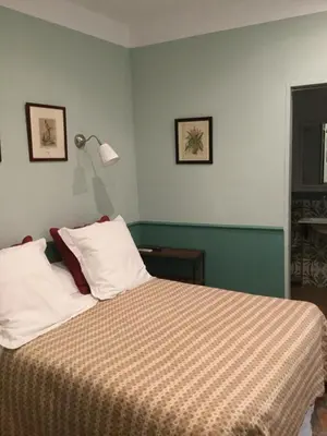 Cama o camas de una habitación en Hostal Casa Del Buen Viaje