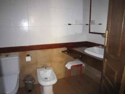 Un baño de VIVIENDA SAN AGUSTÍN