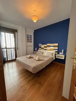 Cama o camas de una habitación en Apartamento Con Encanto San Basilio