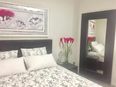 Cama o camas de una habitación en Apartamento doña María Coronel Sevilla