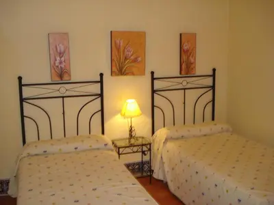 Cama o camas de una habitación en Pensión Bienvenido