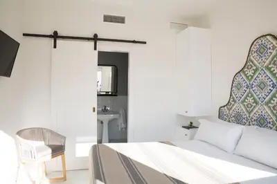 Cama o camas de una habitación en nüa santiago15