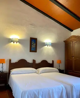 Cama o camas de una habitación en El Molino de La Quinta
