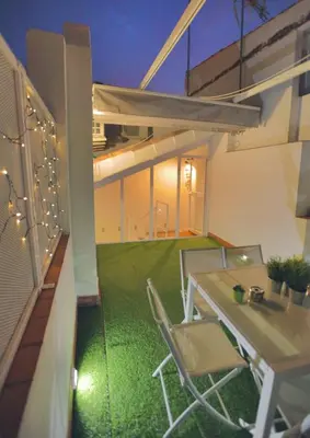 Un patio o zona al aire libre en Casa con Terraza San Fernando