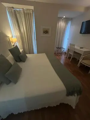 Cama o camas de una habitación en Hostal Plaza