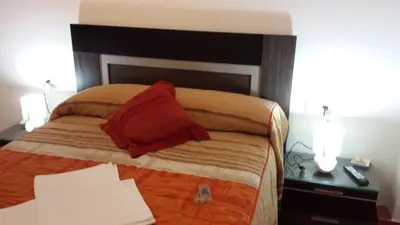 Cama o camas de una habitación en Pension Gran Plaza