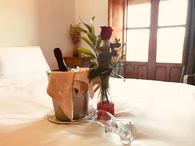 Cama o camas de una habitación en El Mesón de Despeñaperros