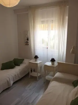 Cama o camas de una habitación en Apartamento Con Patio Cerca Mezquita