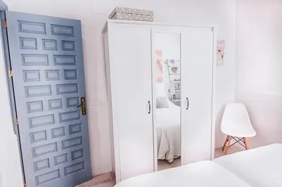 Cama o camas de una habitación en Mercado Calle Feria