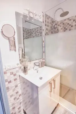 Un baño de Mercado Calle Feria