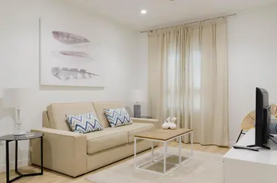 Una televisión o centro de entretenimiento en Lujosa vivienda en plena Judería