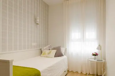 Cama o camas de una habitación en Lujosa vivienda en plena Judería