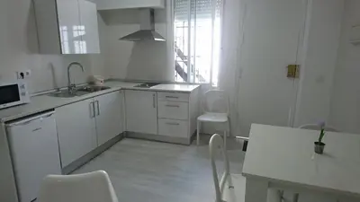 Una cocina o zona de cocina en El Patio De La Piscina