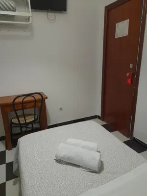 Cama o camas de una habitación en Pensión Hidalgo 2