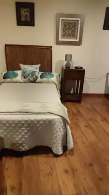 Cama o camas de una habitación en Hotel Baviera