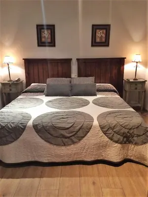 Cama o camas de una habitación en Hotel Baviera