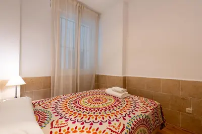 Cama o camas de una habitación en RC Sevilla Centro Histórico CatedralJudería