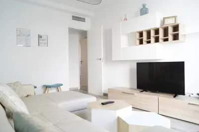 Una televisión o centro de entretenimiento en Apartamento Mihrab, excelente ubicacion en casco historico