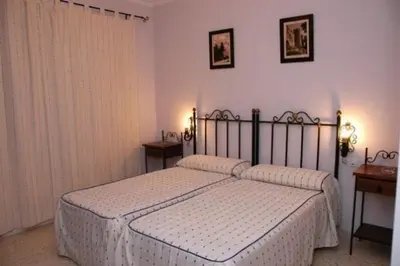 Cama o camas de una habitación en Hotel Don Juan