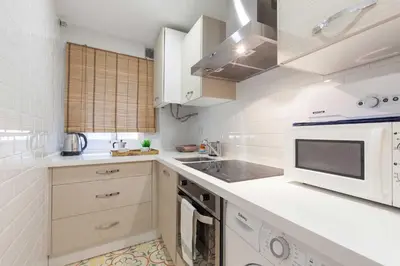 Una cocina o zona de cocina en Precioso apartamento casco antiguo de Sevilla Castellar 23 bajo