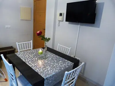 Una televisión o centro de entretenimiento en Najera Suite