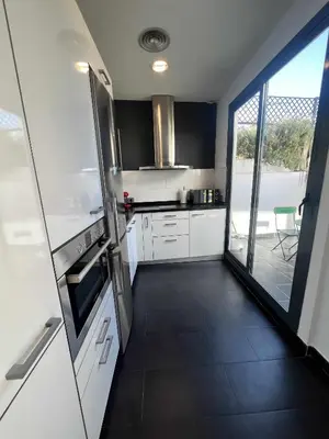 Una cocina o zona de cocina en Ático San Bernardo Terraza y Parking Incluido